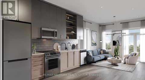 A modern kitchen with a refrigerator on the left and a living room with a couch and a coffee table on the right.