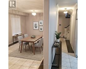 A dining room with a wooden table and chairs.