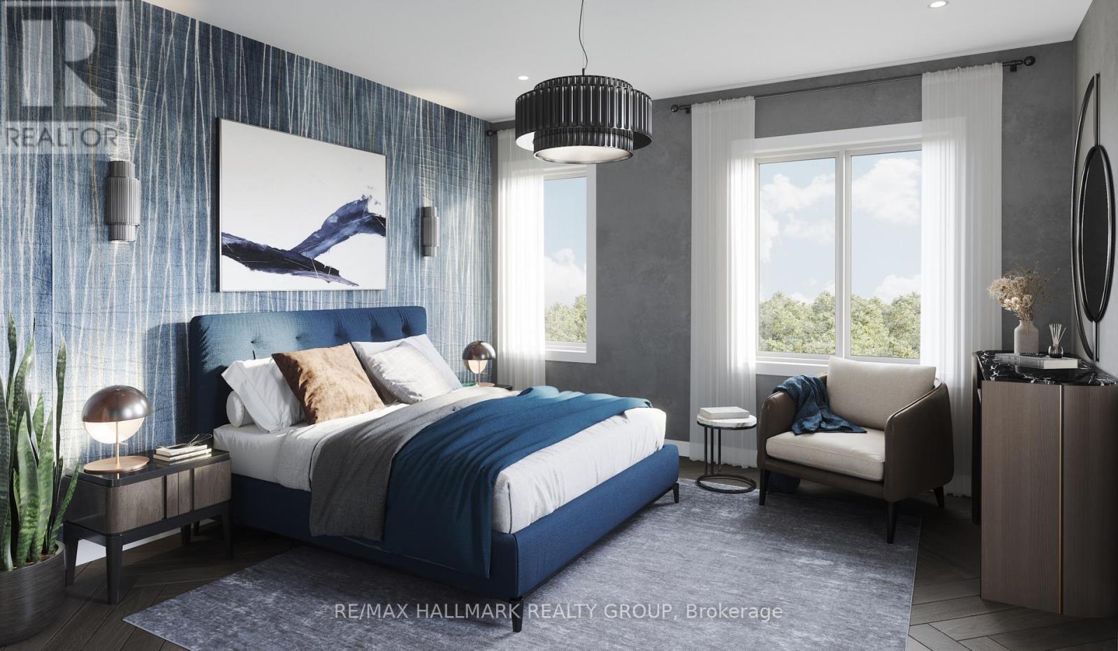 A bedroom with a large bed, a chair, and a painting on the wall.