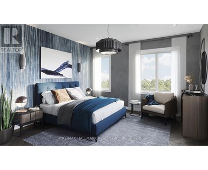 A bedroom with a large bed, a chair, and a painting on the wall.