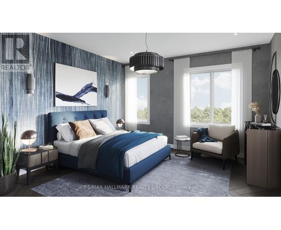 A bedroom with a large bed, a chair, and a painting on the wall.