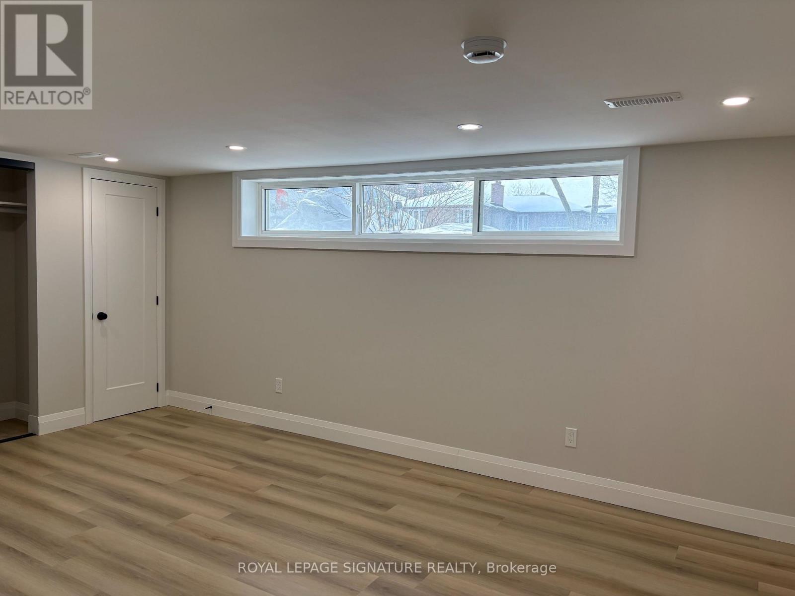 A room with a door and a window.