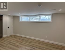 A room with a door and a window.