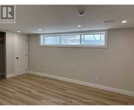 A room with a door and a window.