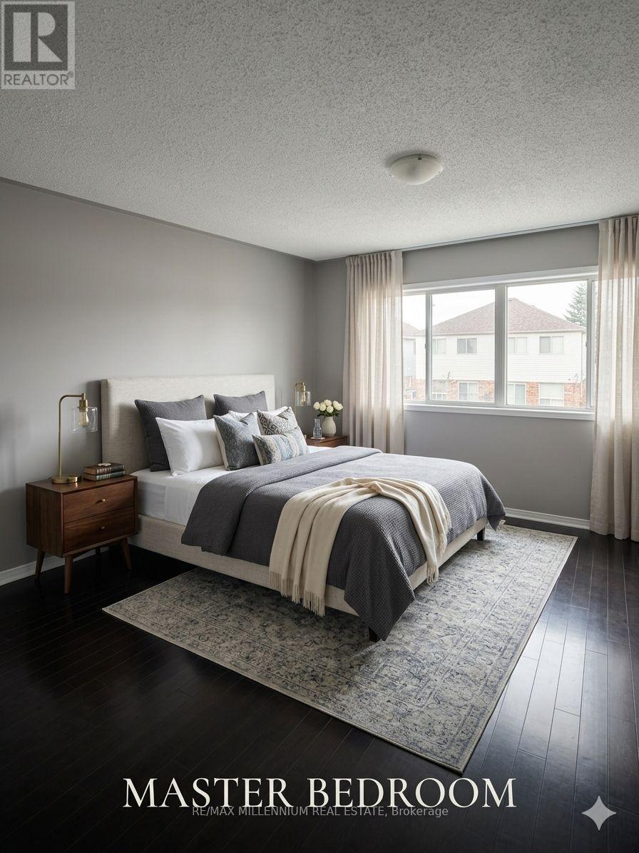 A bedroom with a large bed and a window.