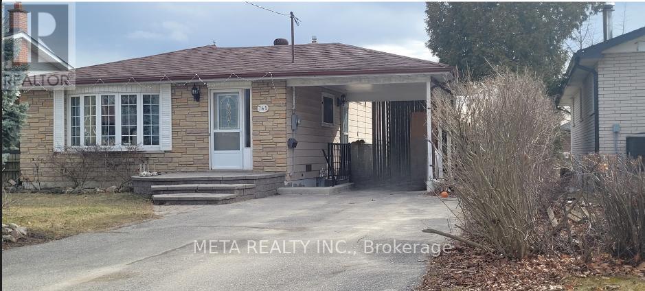 A house with a white door and a sign that says "REALTOR" on the left side.