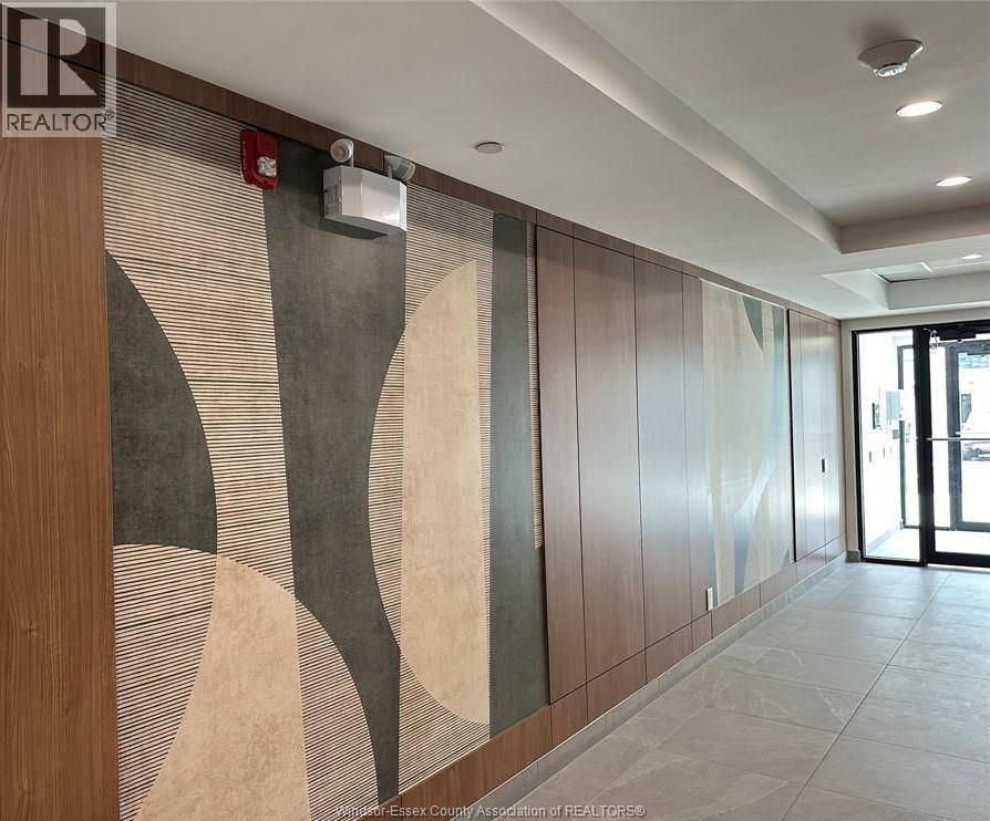 A hallway with a wooden wall and a mural on it.