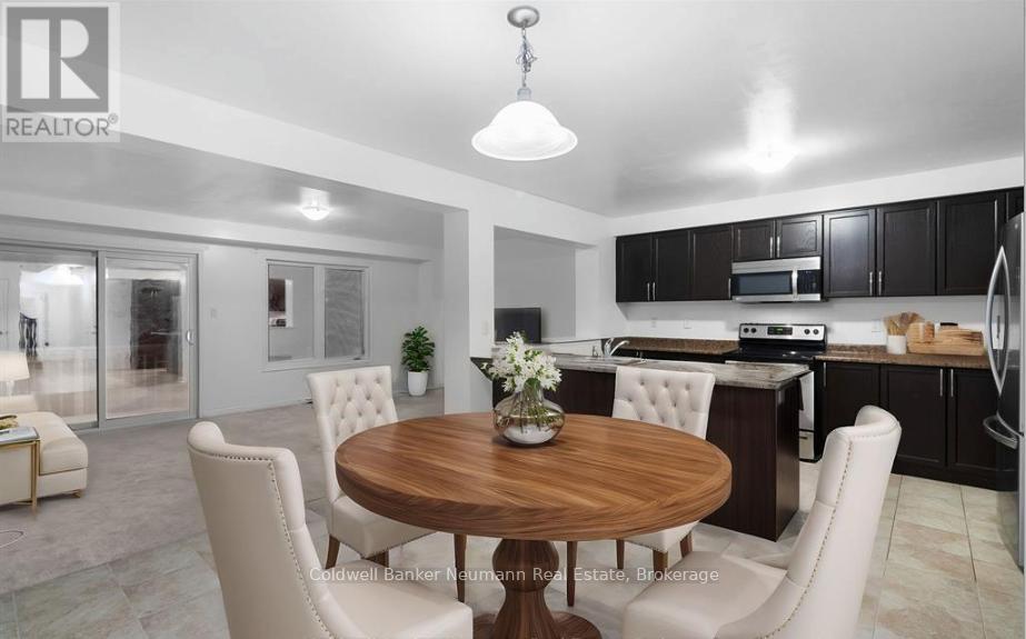 A modern kitchen with a dining table set in the middle.