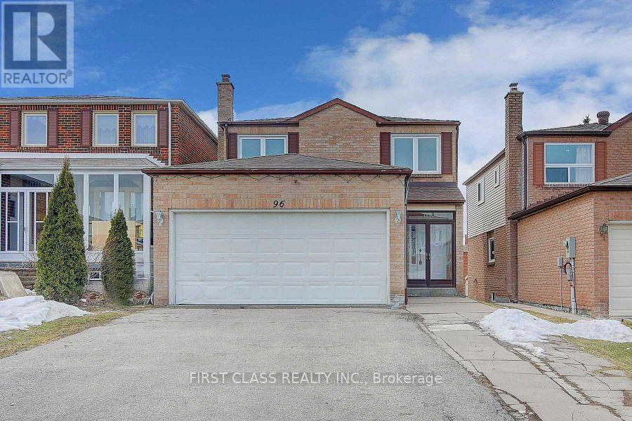 A house with a garage is for sale by First Class Realty Inc.
