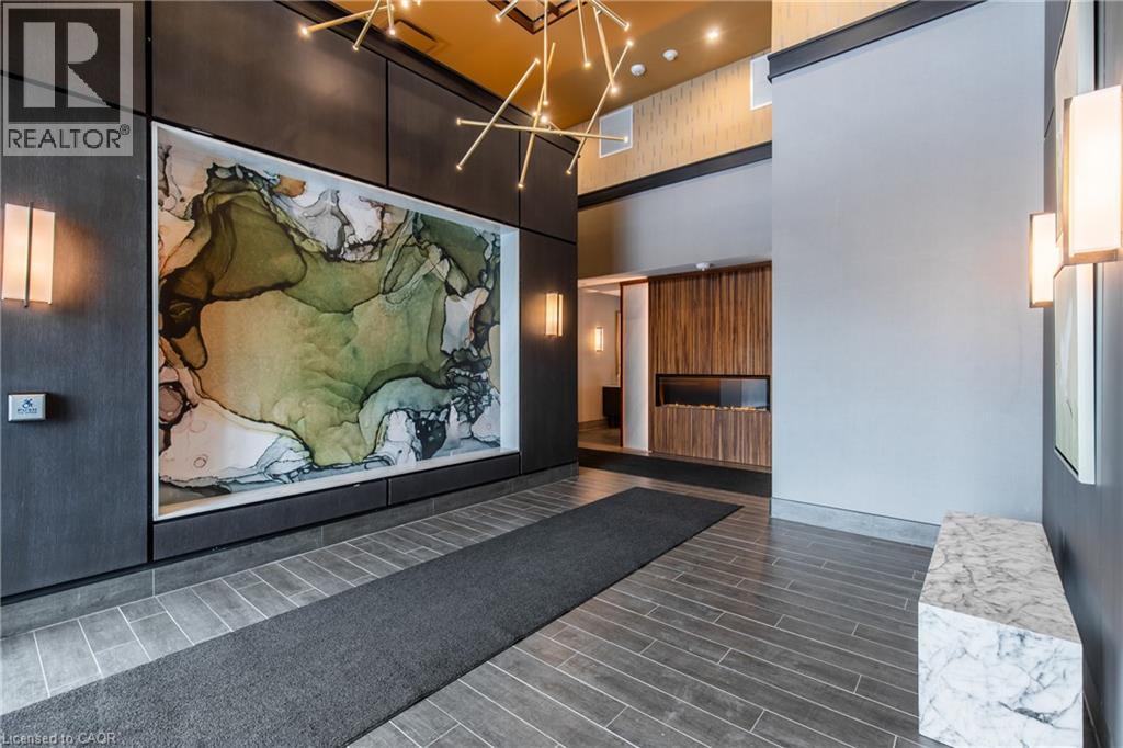 A hallway with a map of the world on the wall.