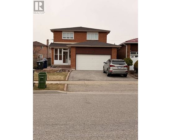 A house with a brown roof and a grey car parked in front.