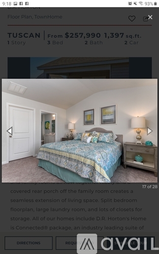 A bedroom with a bed, nightstand, and lamp.