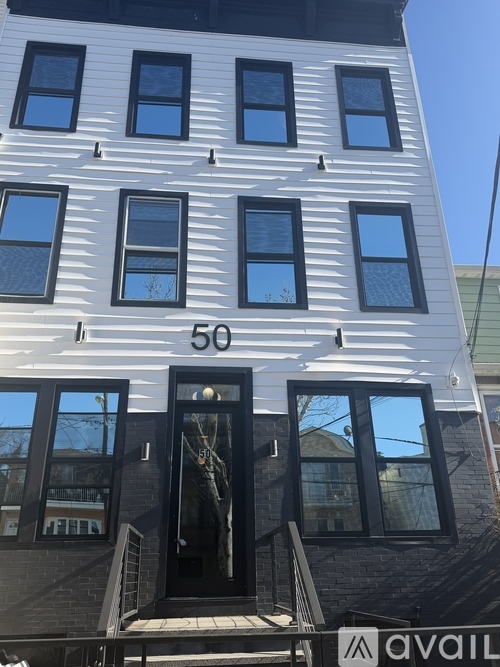A white building with the number 50 on it.