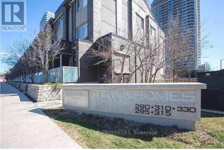 A sign for Townhomes with the numbers 290, 310, 330, 295, 315 on it.