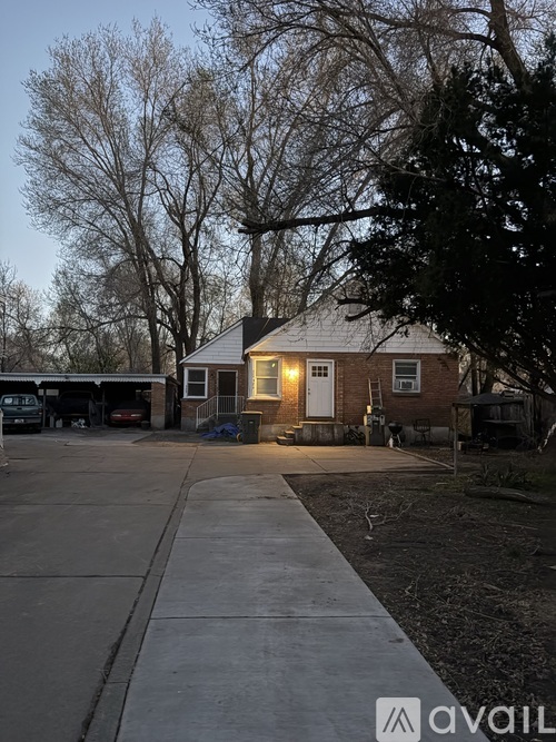 A house with a driveway in front of it.