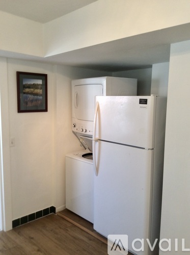 A white fridge and freezer in a kitchen.