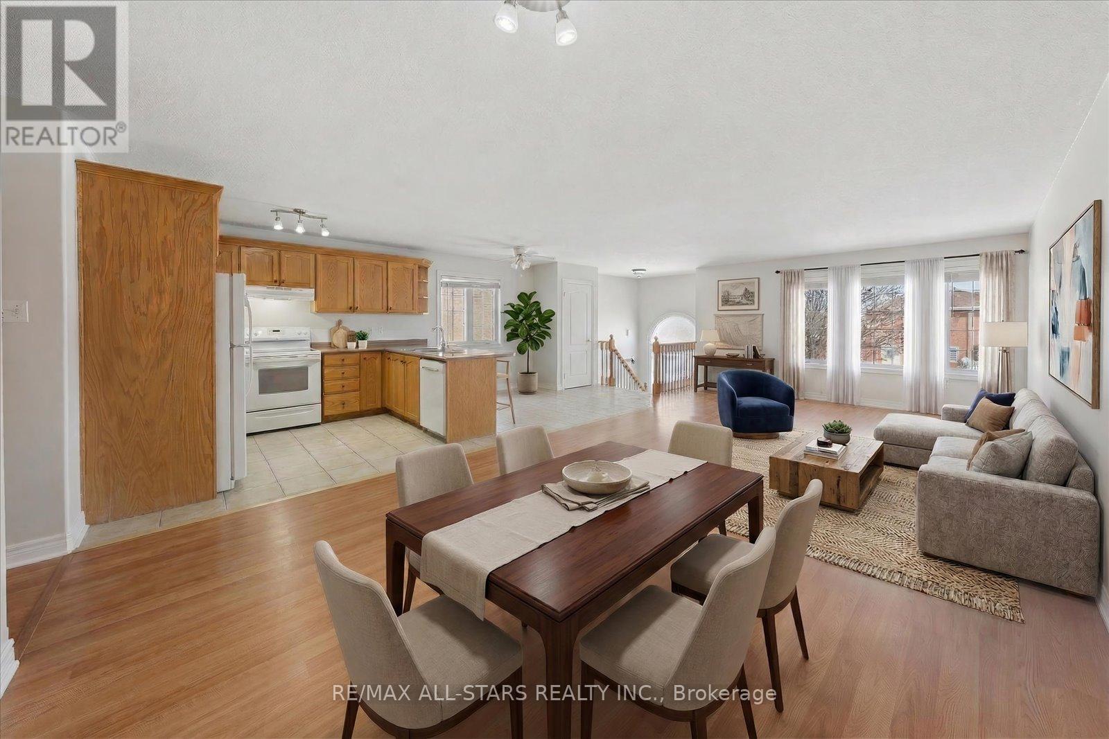 A dining room with a table set for four.