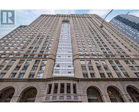 A tall building with a sign that says "REALTOR" on it.