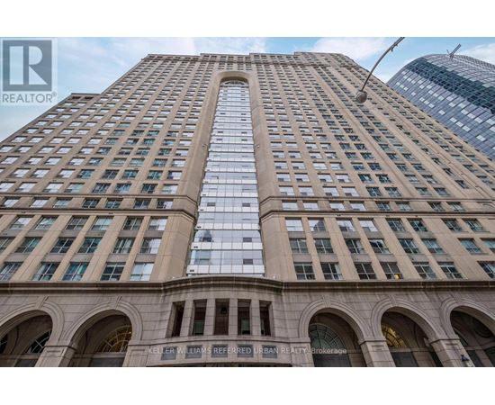 A tall building with a sign that says "REALTOR" on it.
