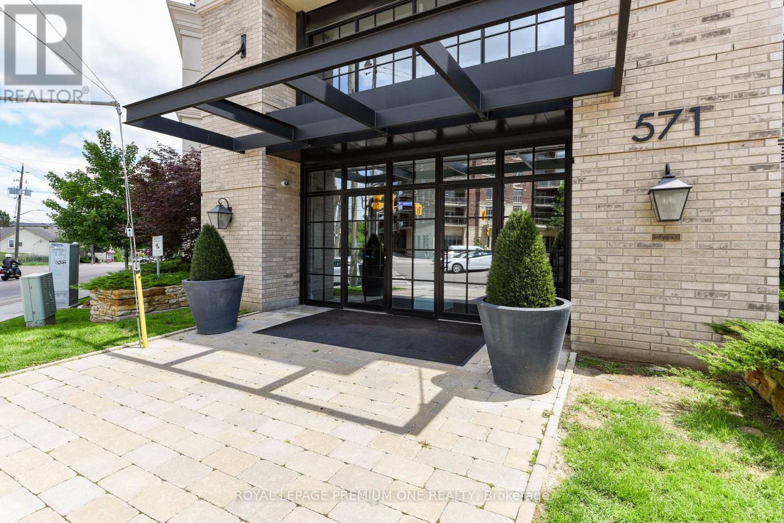 The entrance to a building with the number 571 on it.