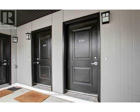 A row of doors with numbers 204 and 203 on them.