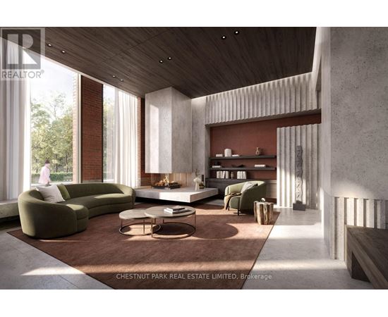 A modern living room with a green sofa and a fireplace.