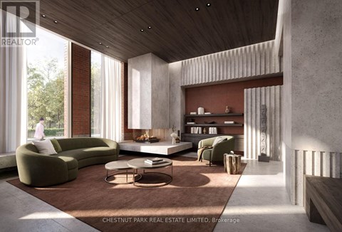 A modern living room with a green sofa and a fireplace.