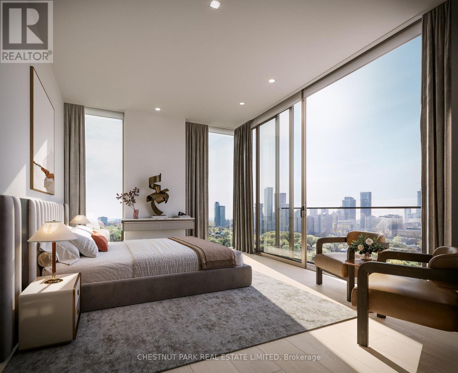 A bedroom with a large bed and a view of the city.