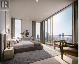 A bedroom with a large bed and a view of the city.