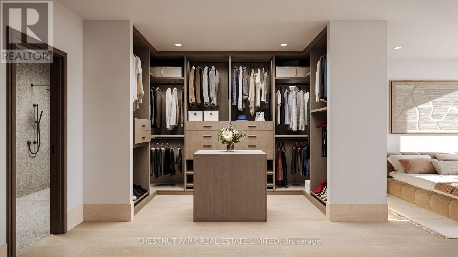 A well-lit, spacious walk-in closet with a bench and a large mirror.