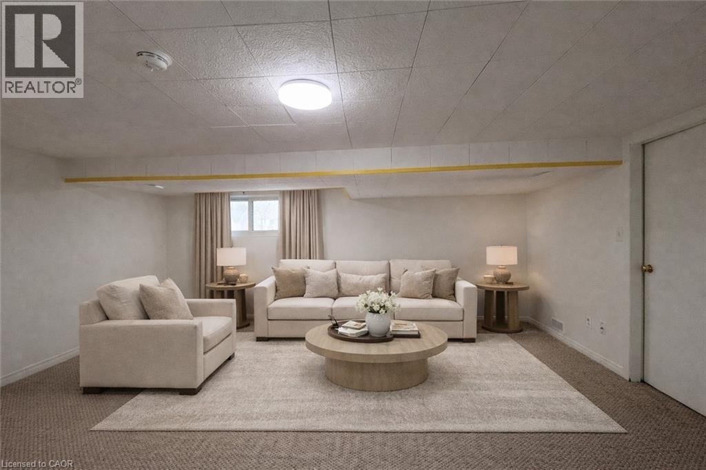 A living room with a couch, chair, and coffee table.