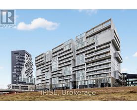 A modern multi-story building with the words "IRISE Brokerage" written on it.