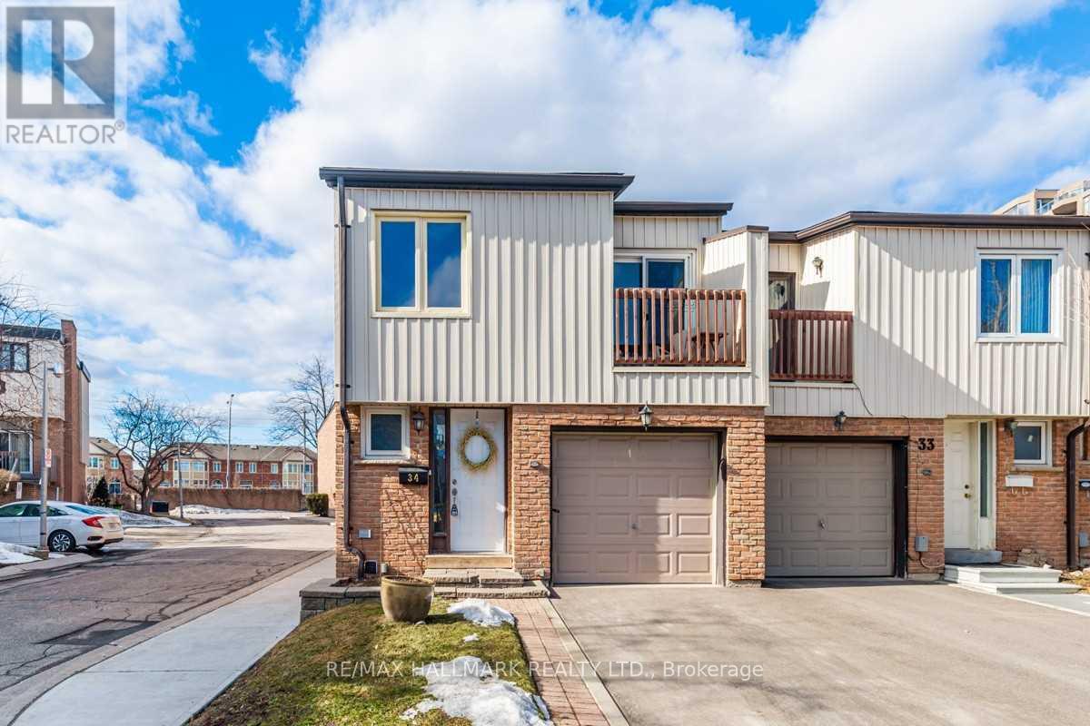 A two-story house with a garage is for sale.