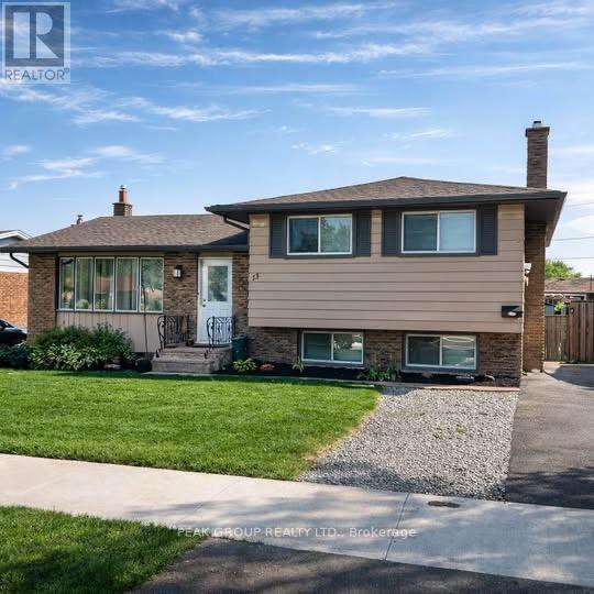 A house with a brown roof and a white door is for sale.