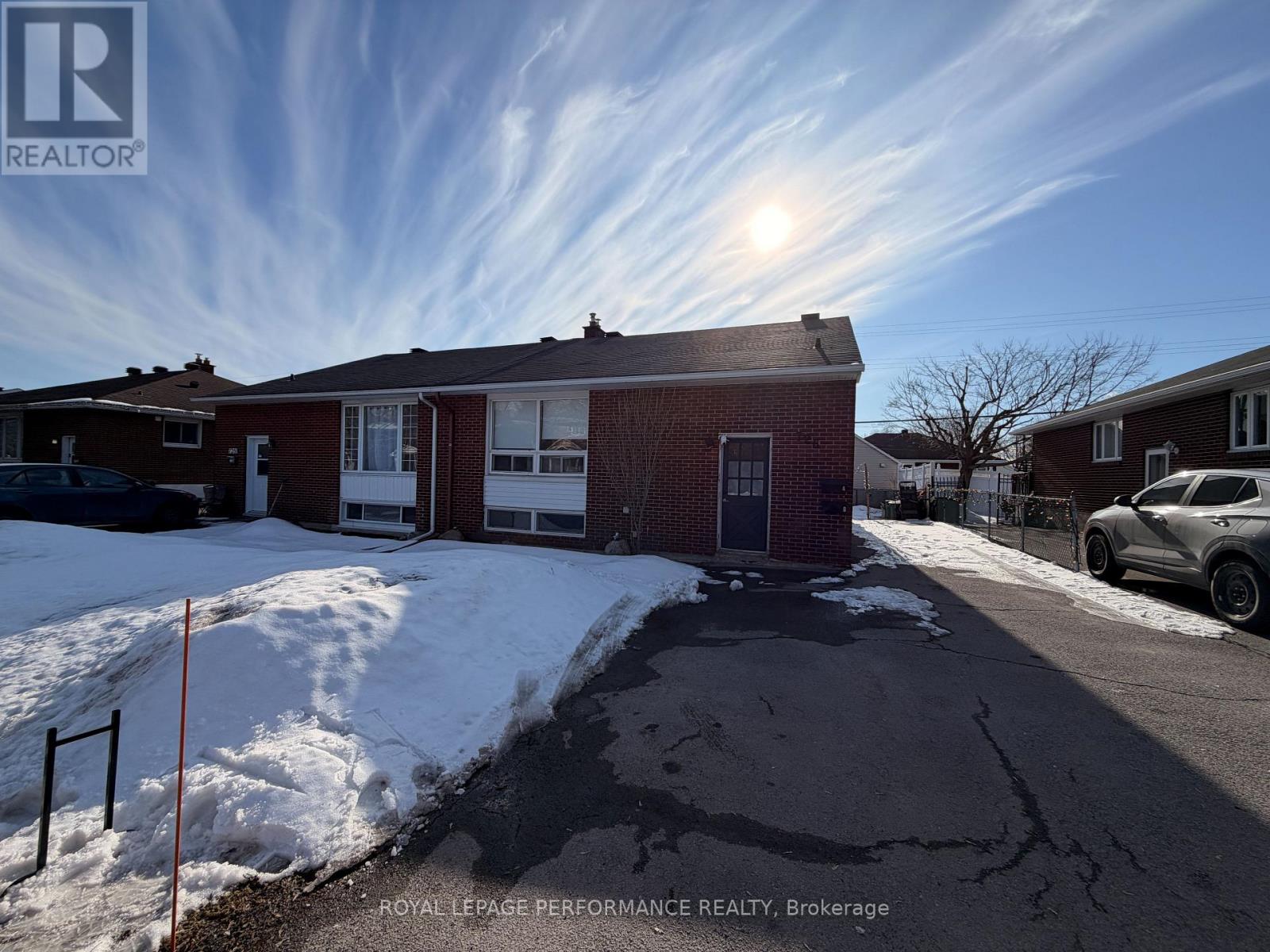 A sunny day at a Royal LePage Performance Realty office in Brokerage.