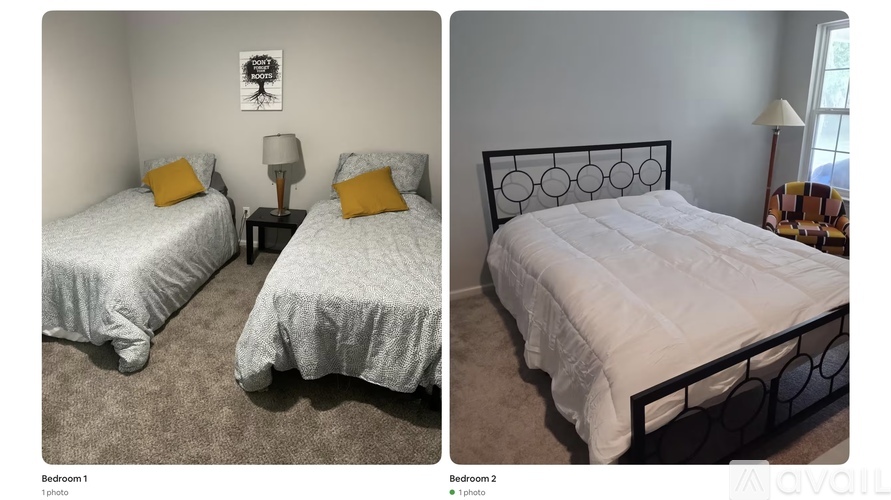 Two twin beds with white bedspreads and pillows.