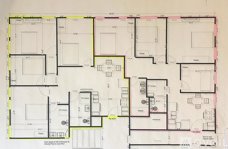 A detailed architectural floor plan of a building with multiple rooms and labeled measurements.