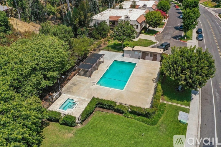 A house with a pool in the backyard.