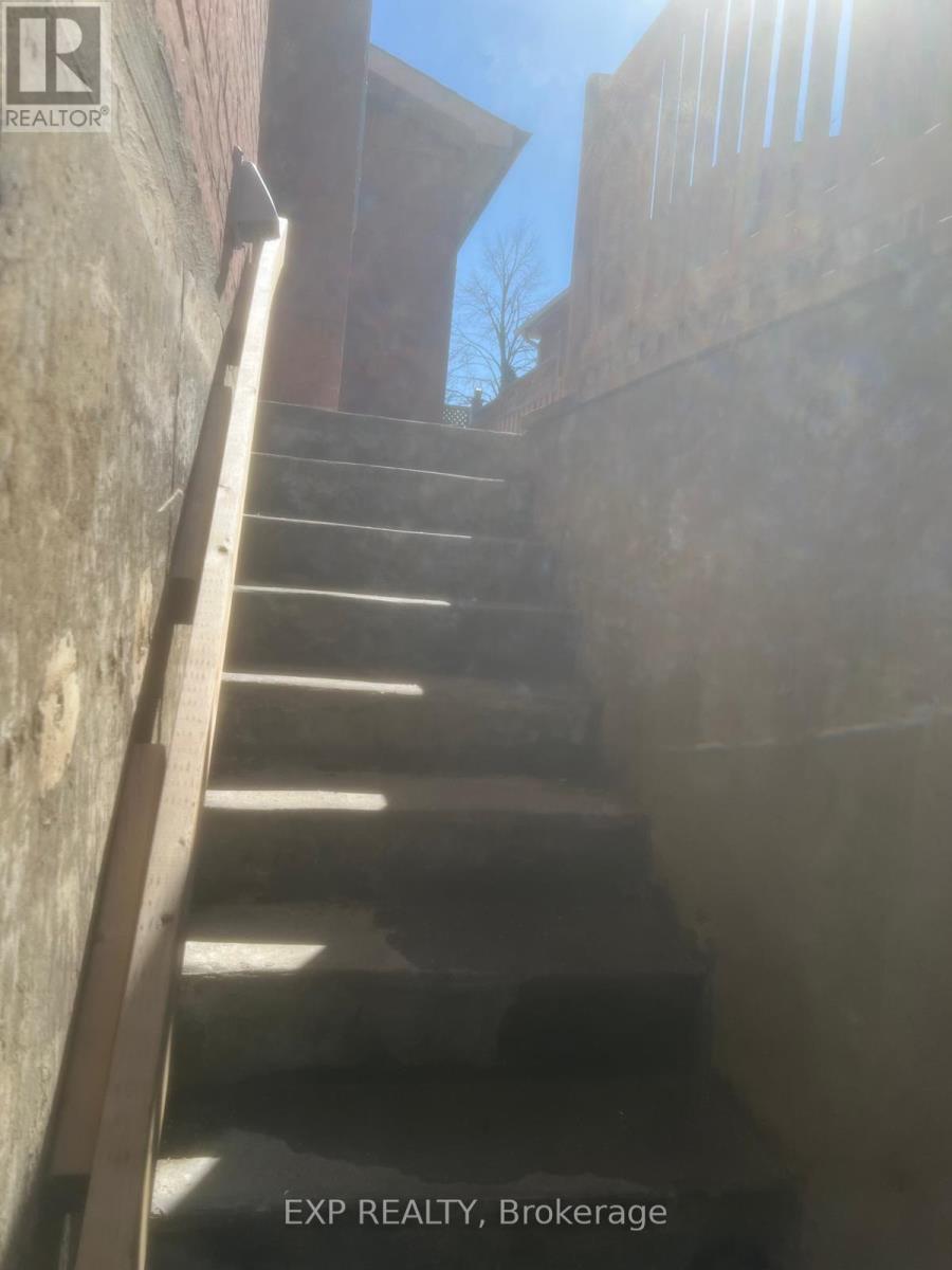 A set of stairs leading up to a doorway.