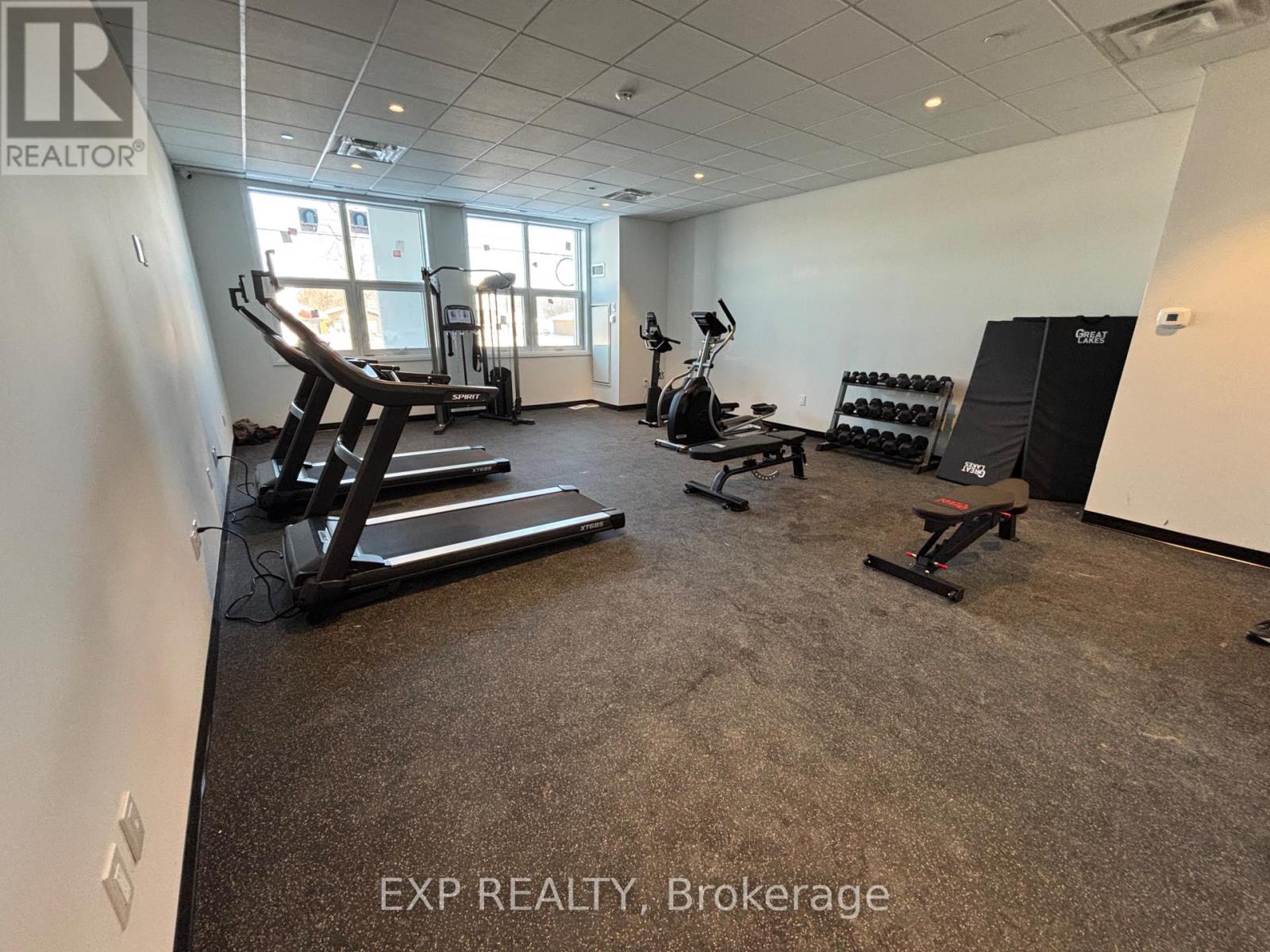 A gym with treadmills, elliptical machines, and weights is available for rent.