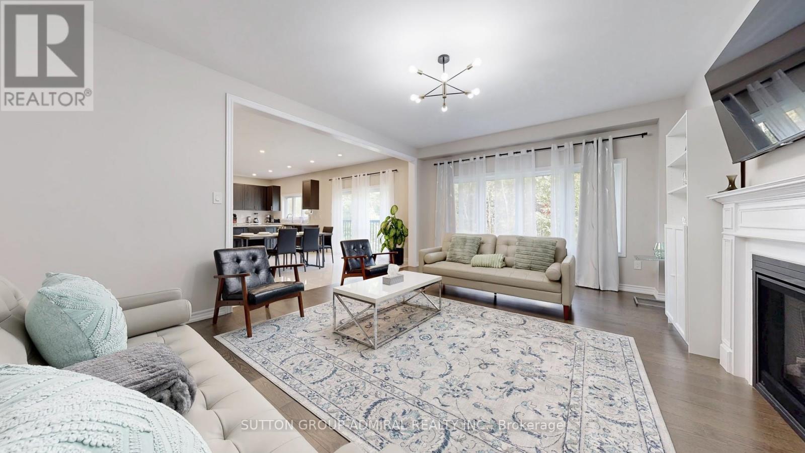 A dining room with a table set for four.