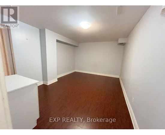A room with EXP REALTY, Brokerage watermark on the floor.