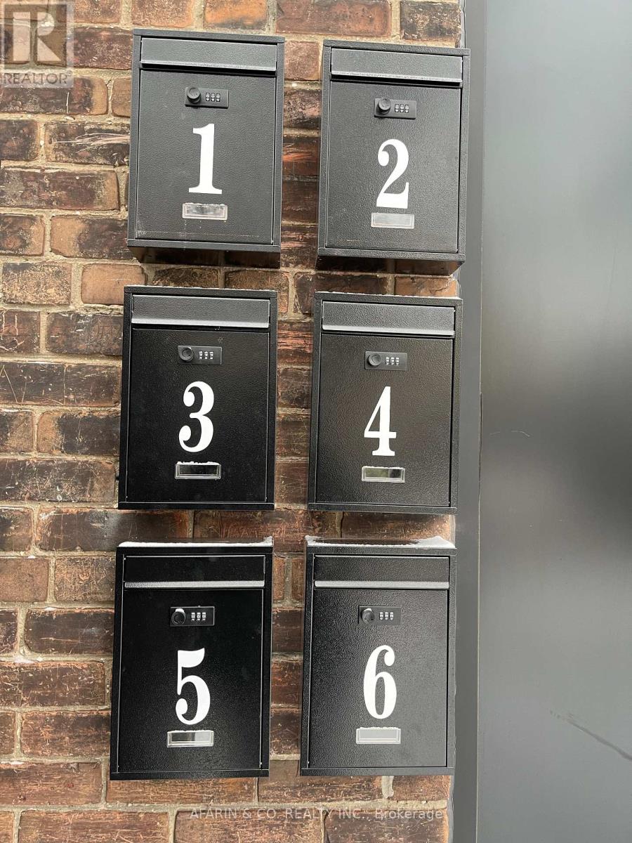 A set of six mailboxes numbered from 1 to 6.