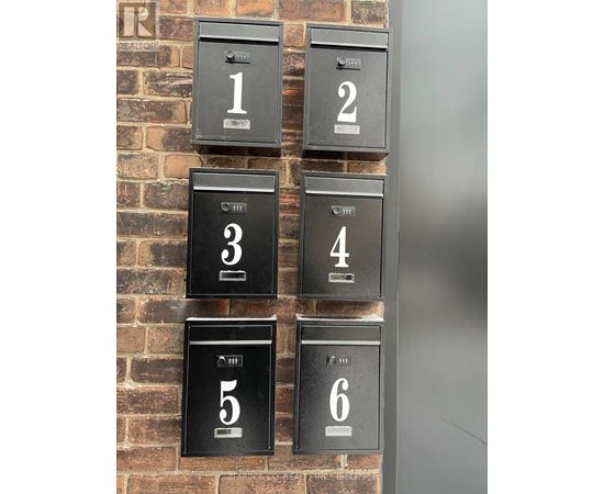 A set of six mailboxes numbered from 1 to 6.