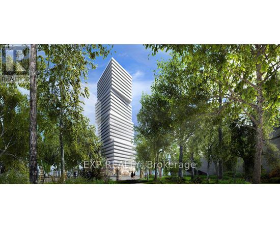 A tall, modern building with horizontal lines is surrounded by trees.