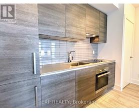 A modern kitchen with EXP Realty, Brokerage written on the wall.
