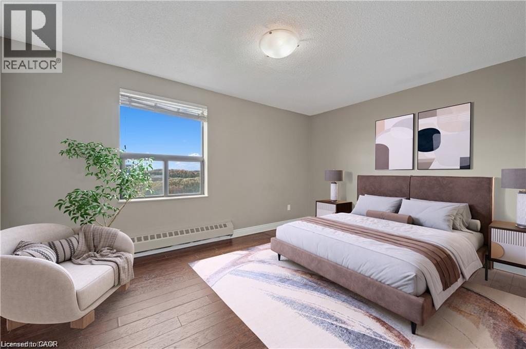A bedroom with a large bed and a chair.