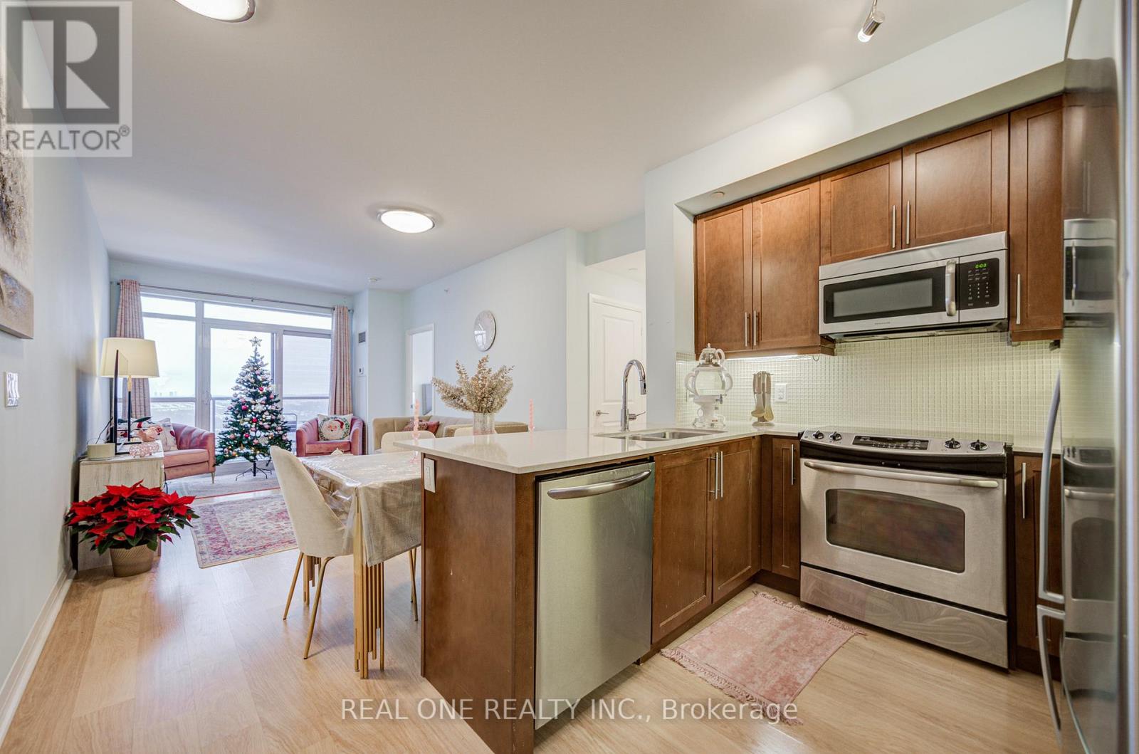 A kitchen with wooden cabinets and a white countertop.