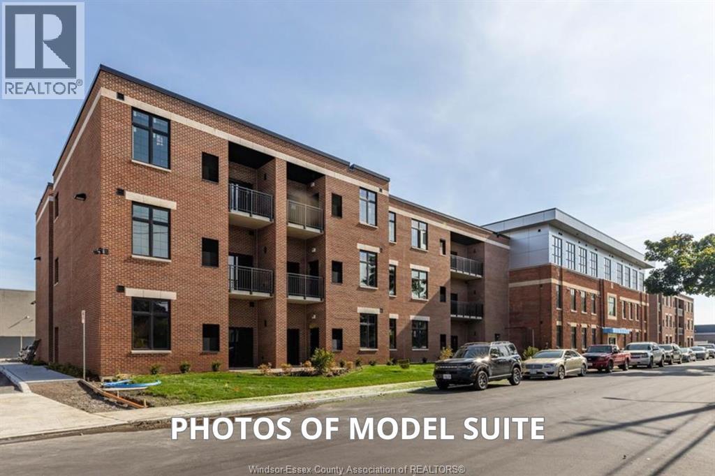 A model suite of a building is shown with the text "PHOTOS OF MODEL SUITE" on the image.