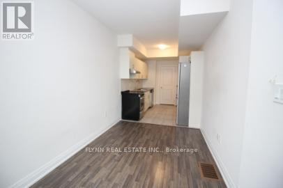 A brokerage office for Flynn Real Estate Inc. is shown.